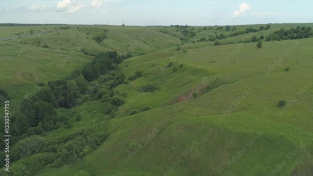 Green field with a river running through it. Natural landscapes of the Nizhny Novgorod region Russia Green field with a river running through it. Natural landscapes of the Nizhny Novgorod region Russia