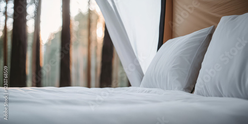 Cozy tent interior, soft bedding with pillows, warmth and comfortable sleeping place for sleeping in the forest in a tent