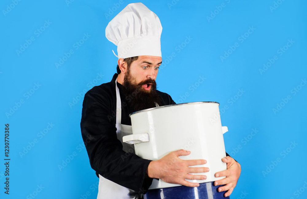 Surprised chef man with big pot at kitchen. Professional chef in uniform with pan or casserole. Cooking and culinary. Bearded male cook prepares food in saucepan. Cookware. Healthy food menu recipes. Surprised chef man with big pot at kitchen. Professional chef in uniform with pan or casserole. Cooking and culinary. Bearded male cook prepares food in saucepan. Cookware. Healthy food menu recipes.