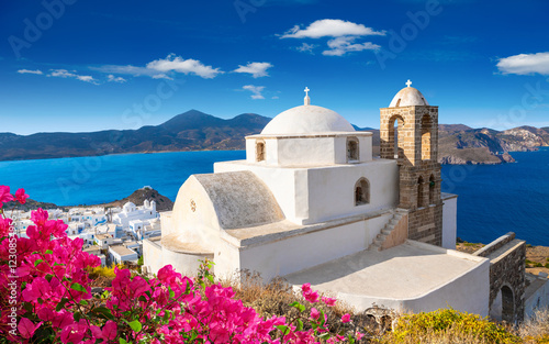 Fototapeta Naklejka Na Ścianę i Meble -  One of the cozy streets of Plaka town. Milos island, Greece