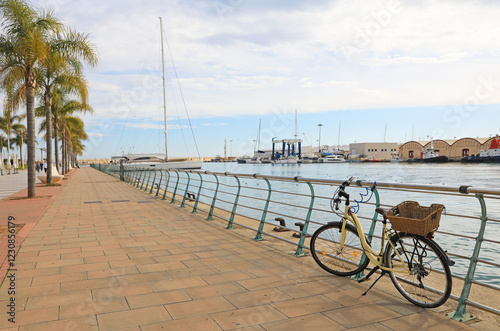 bicicleta aparcada en el paseo peatonal de gandia  puerto rio serpis valencia venecia canal 4M0A7202-as25 photo