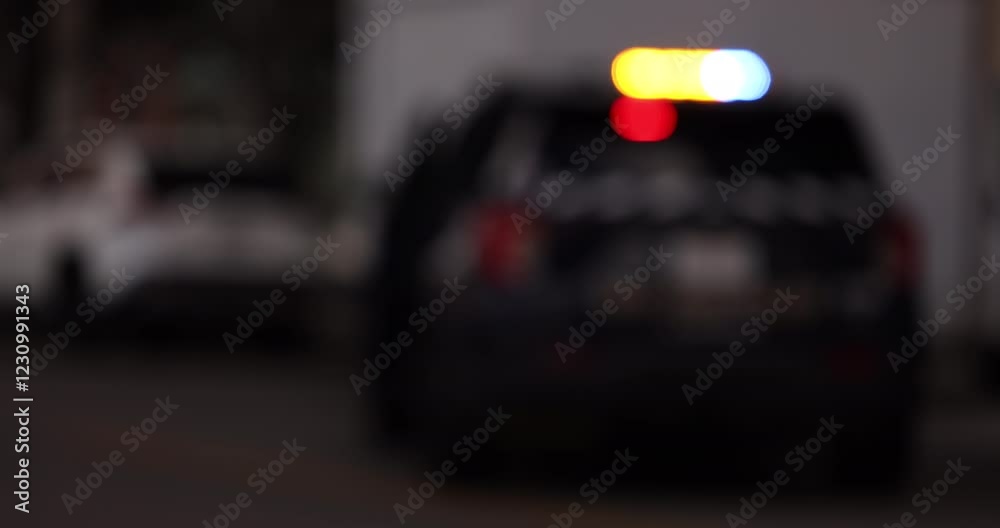 Day time view of abstracted bokeh of a police unit responding to an emergency on a city street. Day time view of abstracted bokeh of a police unit responding to an emergency on a city street.