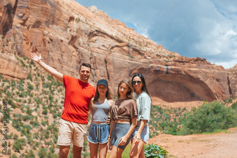 Family on trail at Fire Valley in Utah