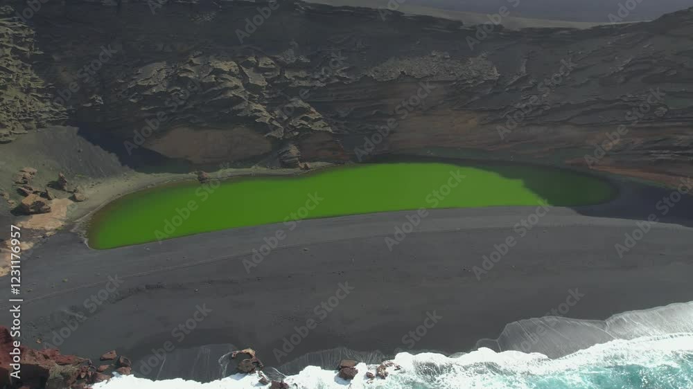 Aerial drone view of mountain sea and volcanoes in Lanzarote, Canary Islands, Spain
