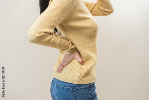 Pain body muscles stiff problem, asian young woman, girl painful with back pain, body ache from work holding massaging rubbing shoulder hurt, sore on white background. Health care and medical concept.