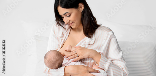 Happy mother breastfeeding ...