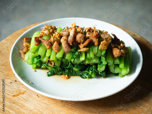 Choy Sum with salty fried pork photo