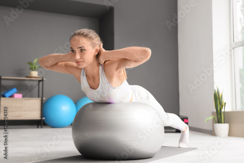 Sporty young woman with fit...