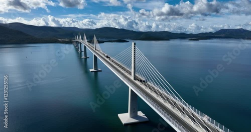 Aerial fly vehicle traffic at Peljesac Bridge, Cable-stayed connection above the water of Dubrovnik Neretva County, Croatia