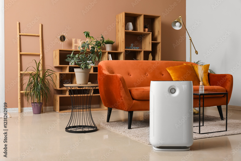 Fototapeta premium Interior of modern living room with air purifier and brown sofa
