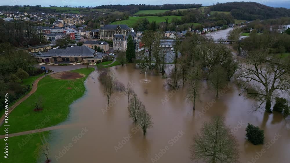 Dramatic drone view of the flooded Le Parc des Ondines public park and buildings, Changé in Mayenne, France.