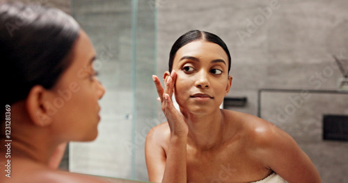 Bathroom, mirror and woman with check for skincare, self care and face inspection with glow in morning. Home, reflection and female person with beauty for cosmetics, acne treatment or hygiene routine