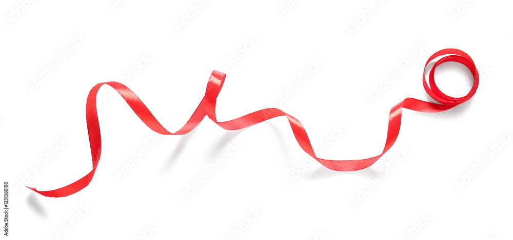 Curly red ribbon on white background