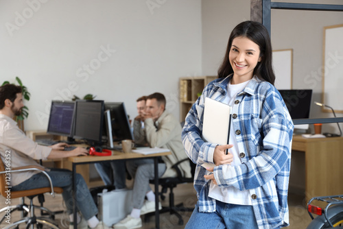 Female programmer with lapt...