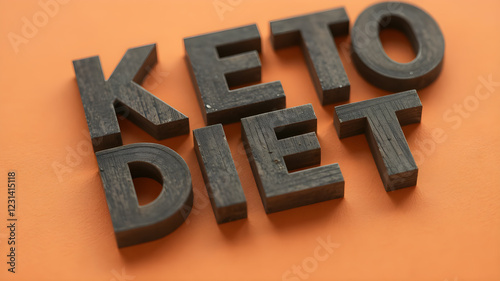 keto diet word abstract in vintage letterpress wood type on orange background.Ketogenic friendly food concept.Keto diet low carbs food. Healthy products. Diet concept.
 photo