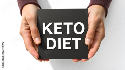 Keto diet, “Ketogenic” is a term for a low-carb diet. Get more calories from protein and fat and less from carbohydrates, Keto diet written on paper .text concept on card. design for cover, banner
 photo