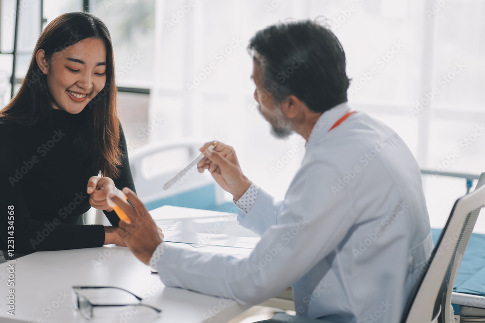 Fototapeta premium Doctor gives patient prescription medication