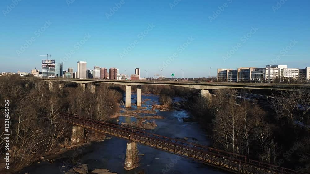 Drone shot of the Richmond, Virginia skyline from Belle Isle Park during winter golden hour Drone shot of the Richmond, Virginia skyline from Belle Isle Park during winter golden hour