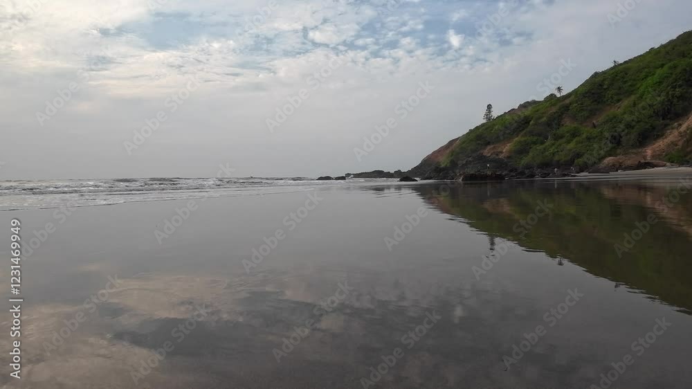 Rolling Ocean Waves At Black Sand Beach Blue Sky Reflect On Beach Sand Rolling Ocean Waves At Black Sand Beach Blue Sky Reflect On Beach Sand