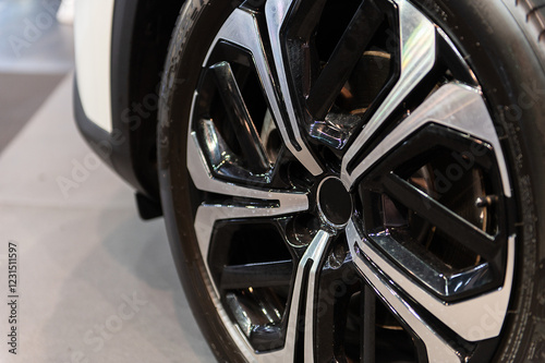 Wallpaper Mural Black alloy wheels, aluminum disc sport with a carbon fiber cover. Light weight and modern cool design. Torontodigital.ca