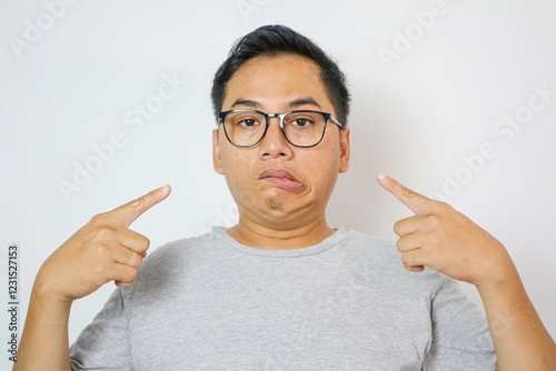 close-up of the mouth of a young men with hemiparesis, Bell's palsy. Forced smile across half face. Muscles paralyzed by inflammation of the facial nerve