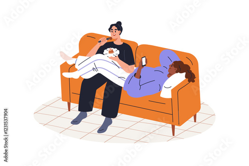 Girls friends relaxing on couch, enjoying leisure time together at home. Eati...