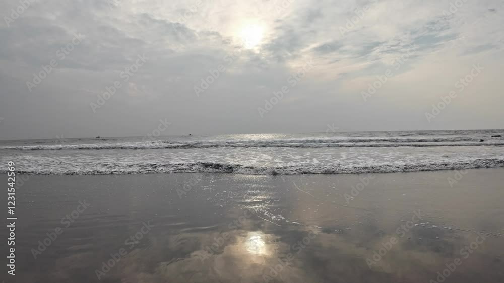 Rolling Ocean Waves At Black Sand Beach Blue Sky Reflect On Beach Sand Rolling Ocean Waves At Black Sand Beach Blue Sky Reflect On Beach Sand
