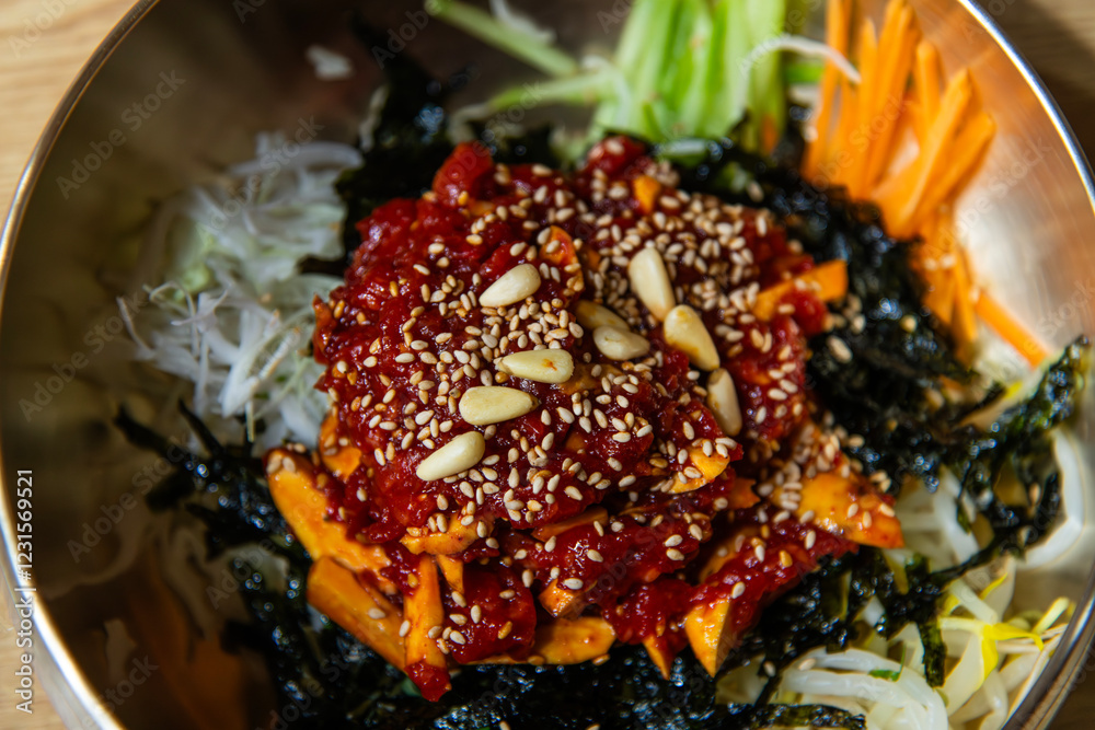 beef sashimi bibimbap in the bowl