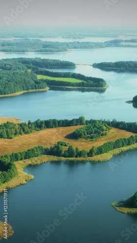 Braslaw District, Vitebsk Voblast, Belarus. Aerial View Of Potsekh Lake, Green Forest Landscape Near Slobodka Village. Top View Of Beautiful European Nature From High Attitude. Bird's Eye View. Famous photo