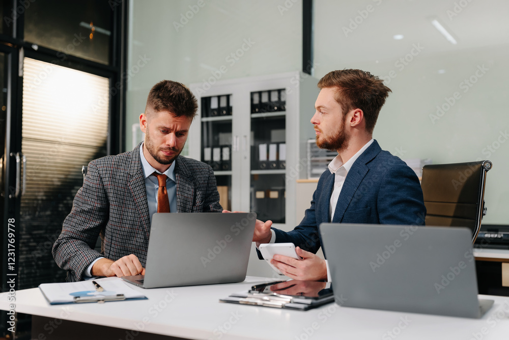 Diverse professionals collaborate on project analysis with financial graphs. Strategic teamwork and insights drive company growth and success.