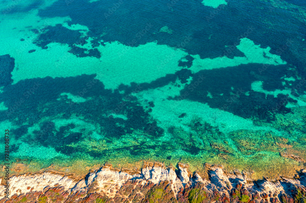 View of seascape with beautiful bay on a sunny day. View from above of wild beach. Nature background. Vourvourou, Greece, Europe