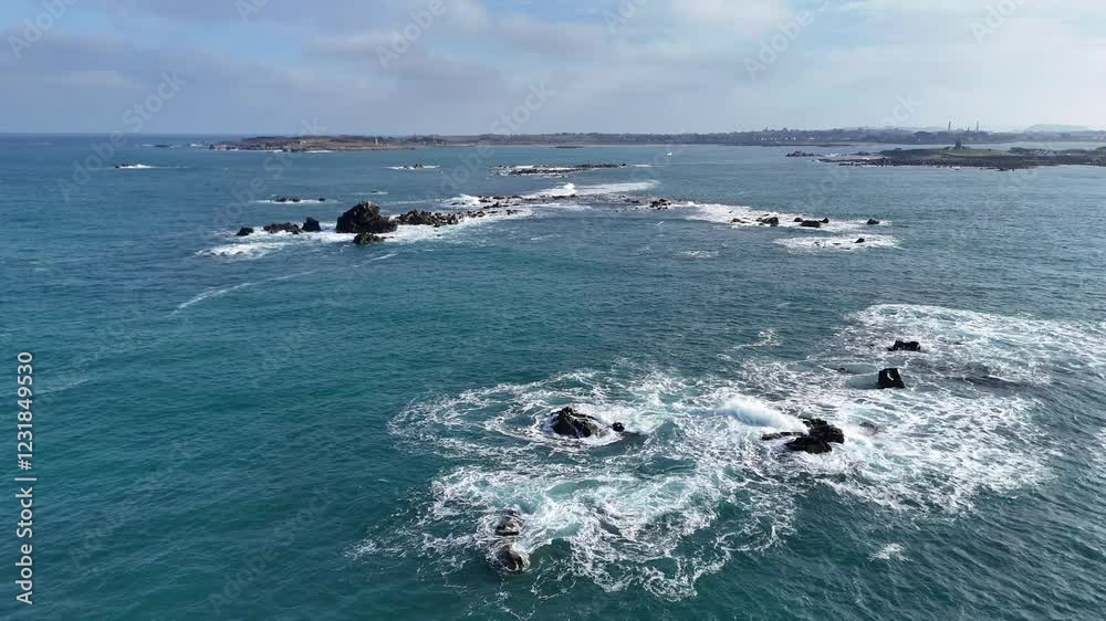 Rocky Outcrop in the Ocean with Crashing Waves 9