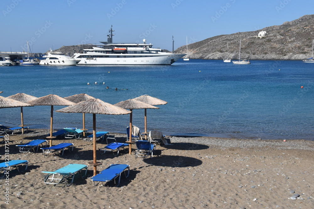 Obraz premium A luxury yacht in the harbour of the idyllic small island of Kythira in Greece