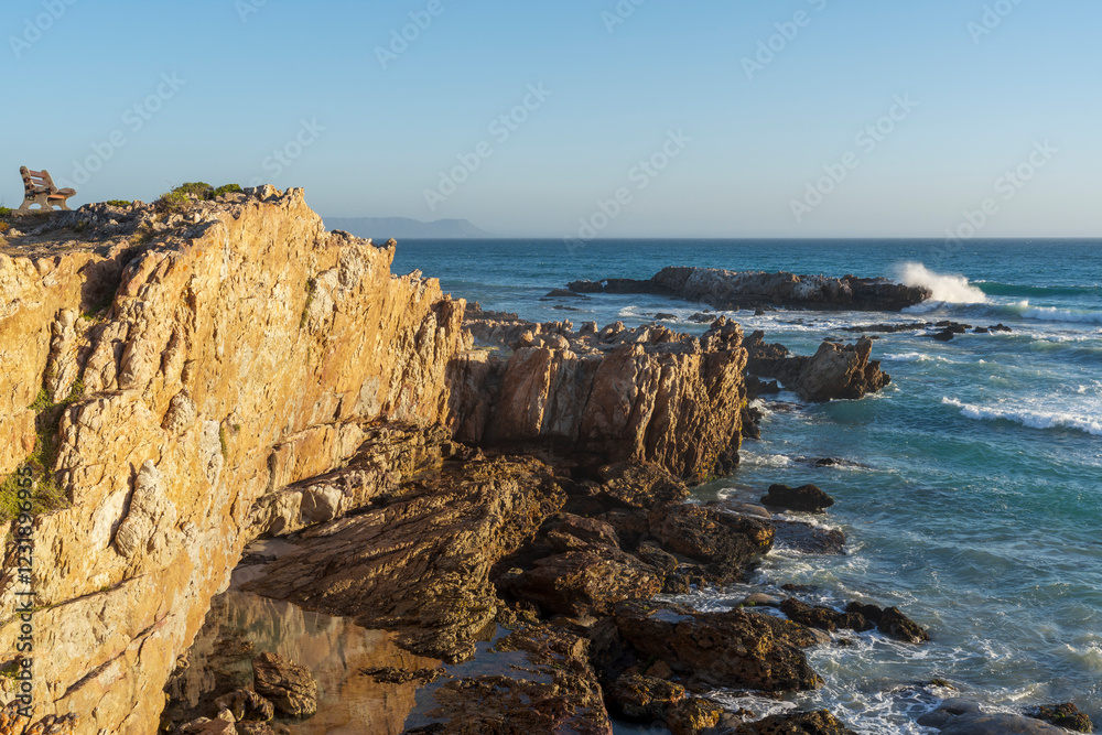 View of the rugged, rocky coastline along the Cliff Path at Hermanus, Whale Coast, Overberg, Western Cape, South Africa. View of the rugged, rocky coastline along the Cliff Path at Hermanus, Whale Coast, Overberg, Western Cape, South Africa.