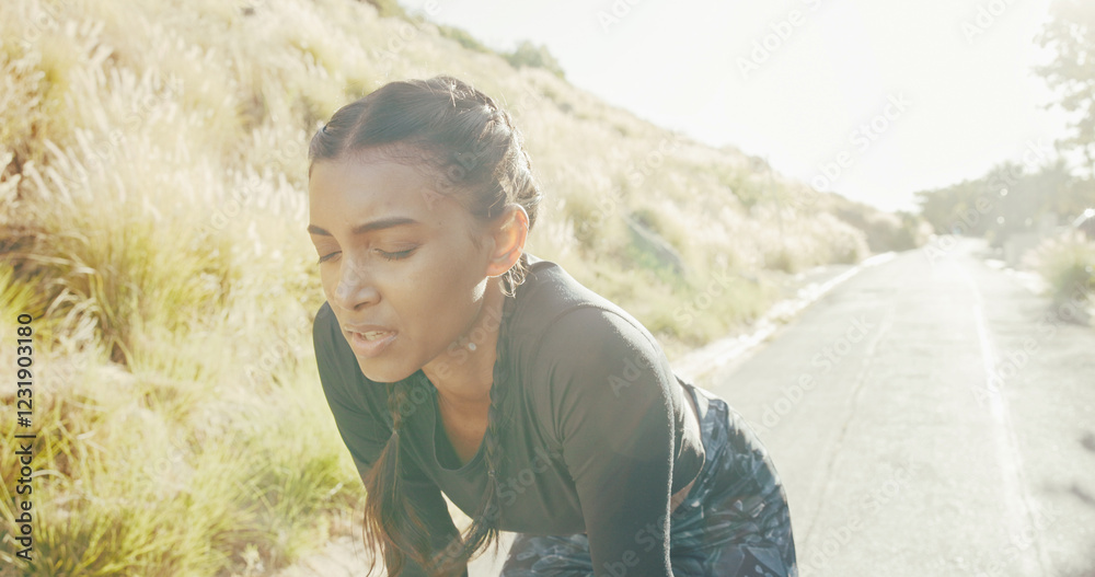 Naklejka premium Tired, woman and running for fitness outdoor for breathe, marathon training and recovery of exercise. Fatigue, female athlete and runner rest with workout break, sports competition and cardio burnout