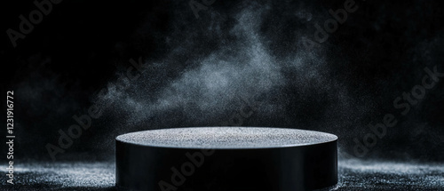 Settled dust texture on a circular surface illuminated against a dark background