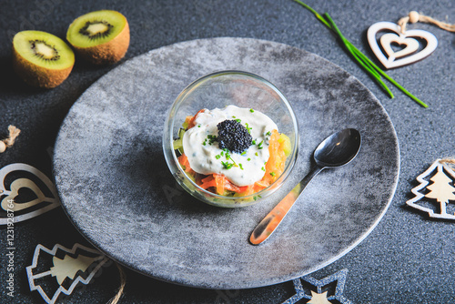 Kiwi salmon cream cheese and lumpfish roe verrine in studio photo