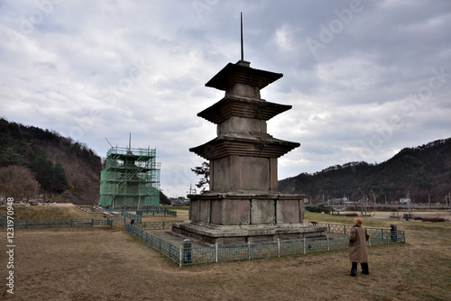 The East and West Three-story Stone Pagodas at the Gameunsa Temple Site in Gyeongju, Korea, are currently undergoing preservation treatment due to severe damage. photo