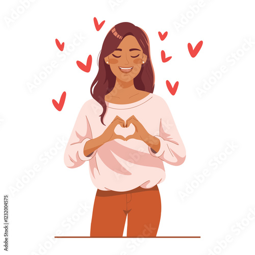 Happy young woman making heart shape with her hands, expressing love and affection valentine concept