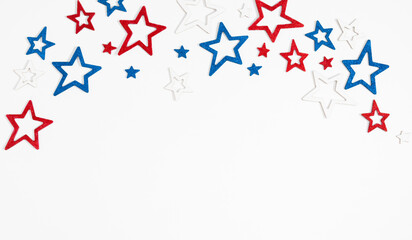Confetti stars pattern on white background. 4th of July, US Independence Day, President's Day, Labor Day in America. Flat lay, top view, copy space