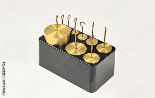 Foto Brass hooked weights scientific laboratory measuring equipment tools