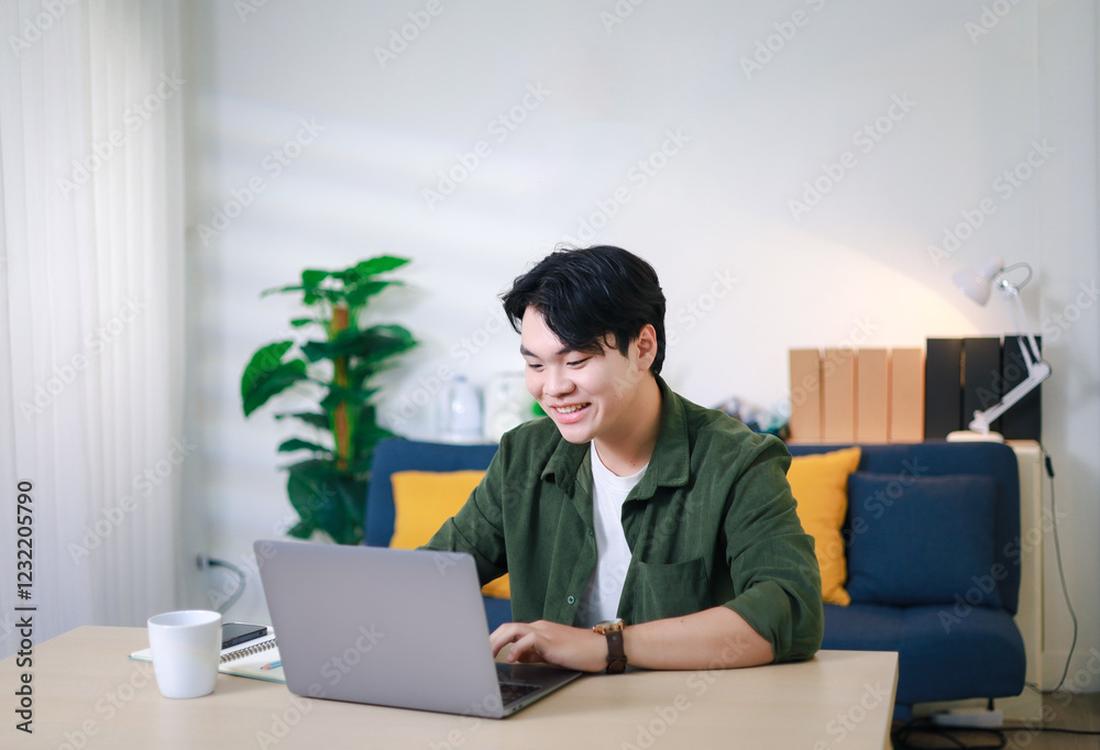 Portrait of home entrepreneur typing on laptop and smiling happily. Portrait of home entrepreneur typing on laptop and smiling happily.