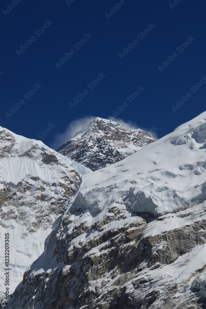 The stunning Himalayan Mountain ranges with snowy  glaciars and breathtaking views of Mount Everest, Ama Dablam and Lhotse while trekking