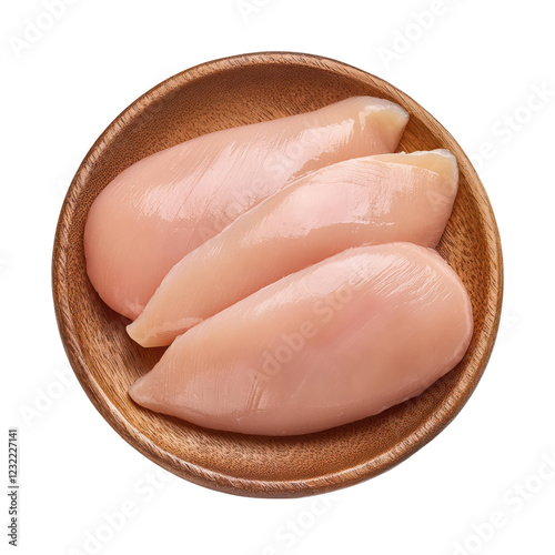 Raw chicken breasts in a wooden bowl, ready for cooking, isolated on white background.