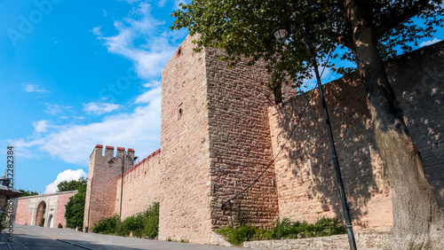 Topkapi Palace walls under a clear blue sky in istanbul, Turkey.
