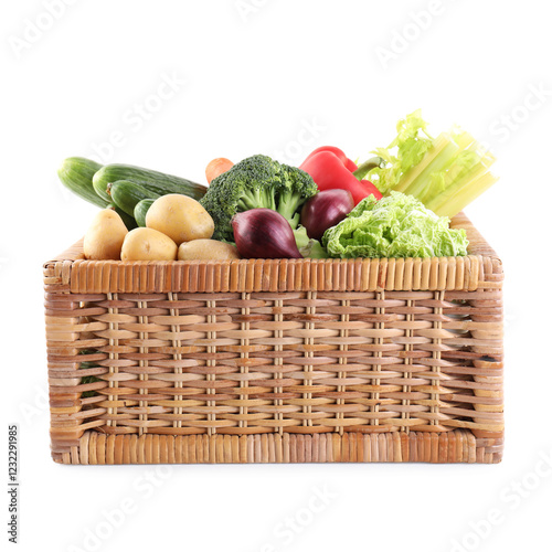 Foto Different ripe vegetables in wicker box isolated on white