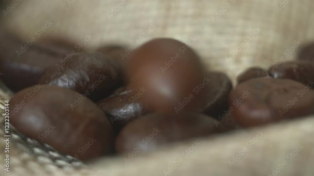 Roasted coffee beans on the table.
Roasted coffee beans on the table.