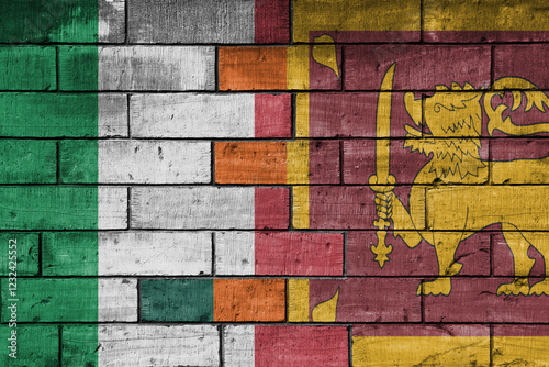 colourful painted big flag of italy and flag of sri lanka on a massive old brick wall background. concept photo