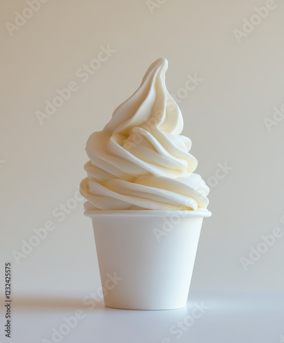 Creamy frozen yogurt in a small white cup against a beige background.