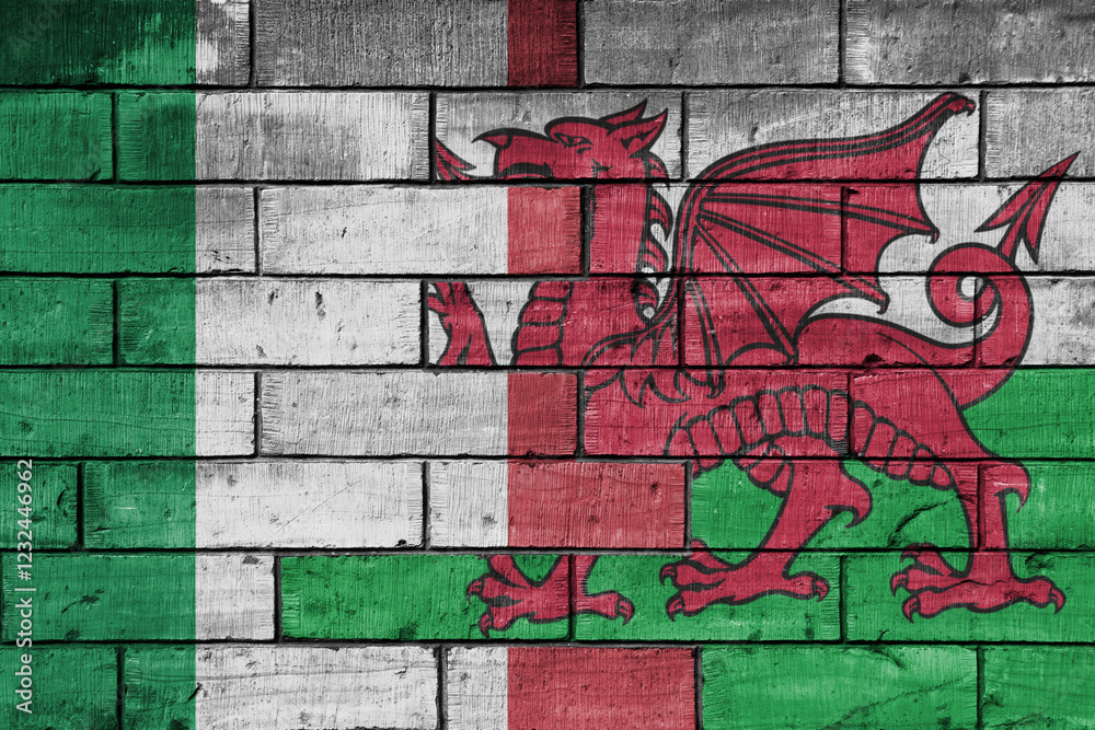 Obraz premium colourful painted big flag of italy and flag of wales on a massive old brick wall background. concept